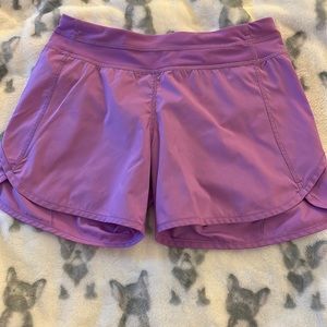 Ivivva workout shorts in light purple. Size 14
